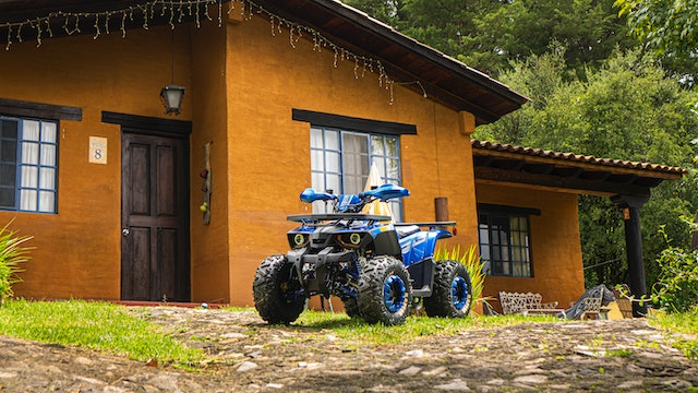 An ATV in Front of the House
