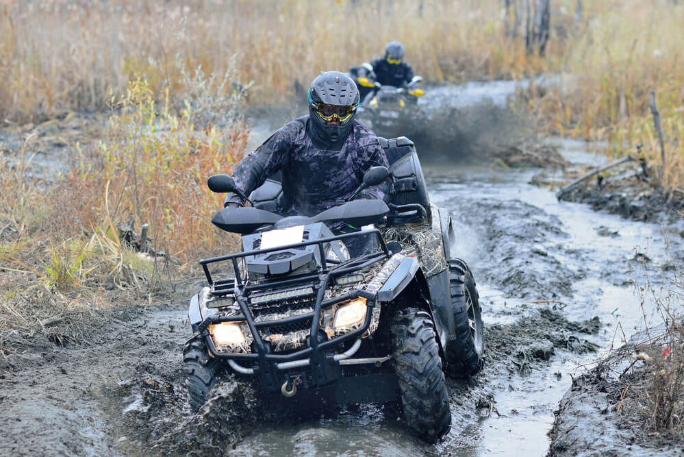 Cool pictures of active ATV driving in mud and wat